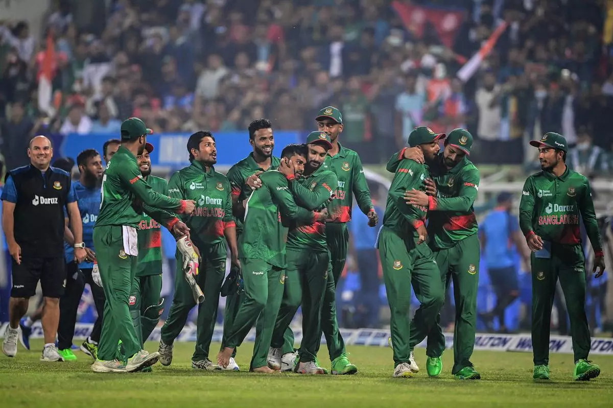 Bangladesh’s players celebrate after their win in the second one-day international (ODI) cricket match between Bangladesh and India at the Sher-e-Bangla National Cricket Stadium in Dhaka on December 7, 2022. 