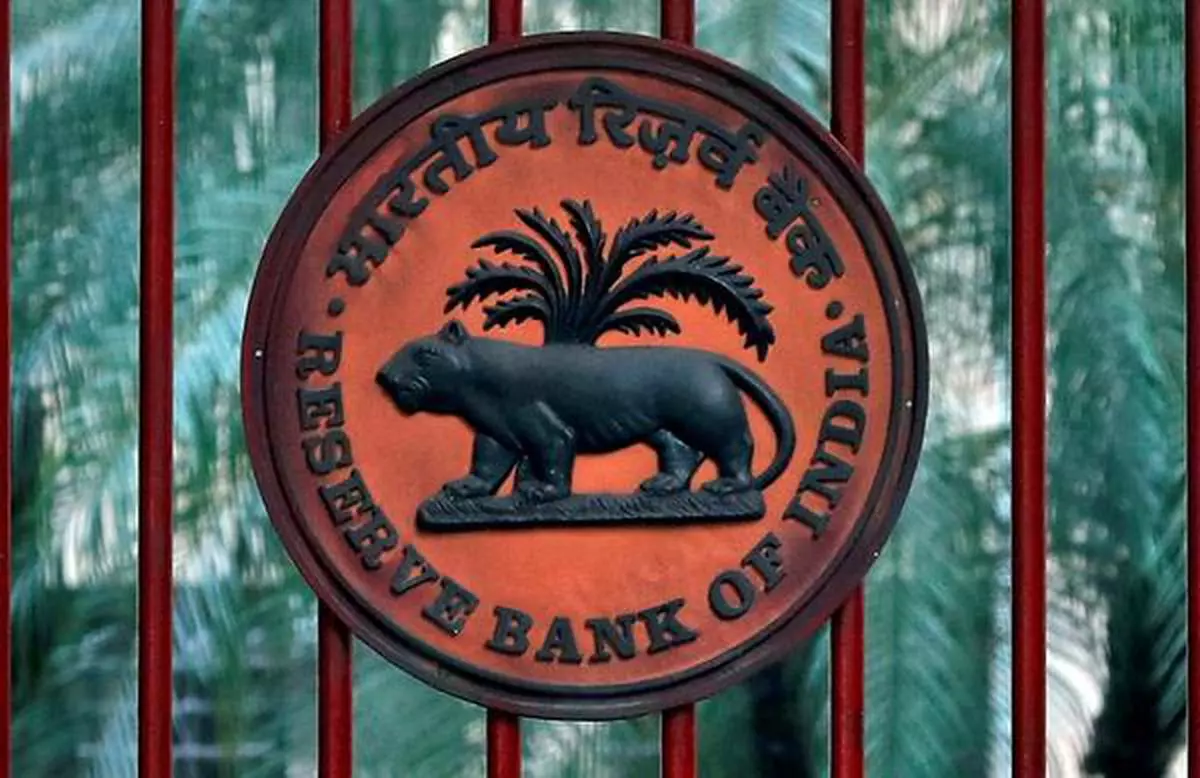 FILE PHOTO: A Reserve Bank of India (RBI) logo is seen at the gate of its office in New Delhi, India, November 9, 2018. REUTERS/Altaf Hussain/File Photo