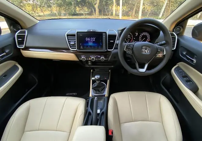 The top-trim eHEV variant now gets a faux carbon-fibre finished IP on the dashboard, with piano-black inserts for complementing the pane The top-trim eHEV variant now gets a faux carbon-fibre finished IP on the dashboard, with piano-black inserts for complementing the pane