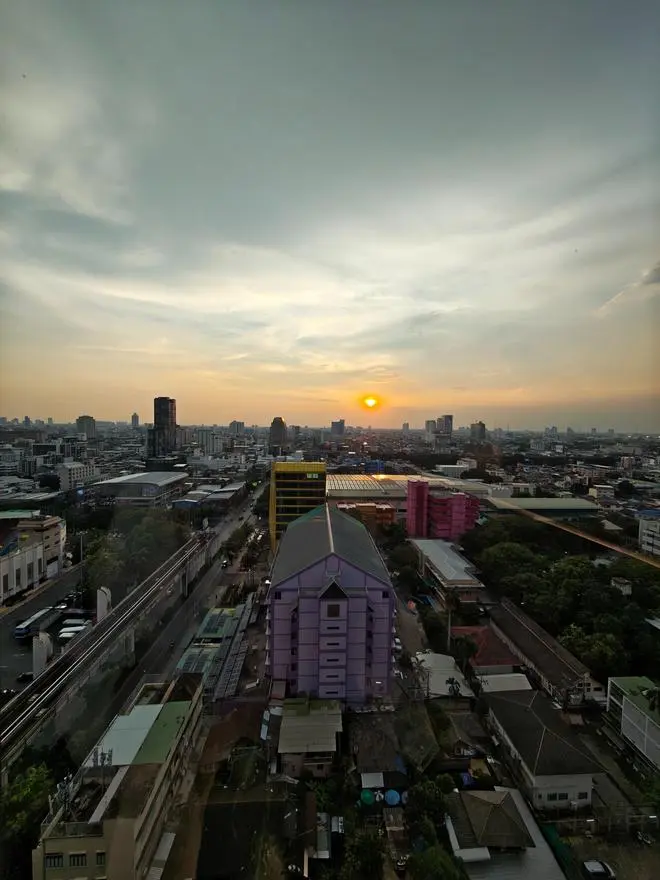 Sundown against a skyline captured at 0.5x