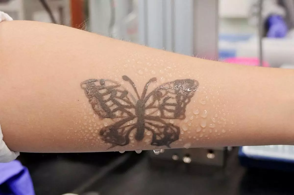 Water sprays on arm are seen with an electronic tattoo (e-tattoo) for the wettability test at the Korea Advanced Institute of Science and Technology (KAIST) in Daejeon, South Korea, July 26, 2022. 