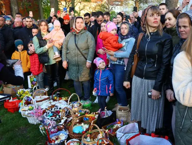 Faithful attend a blessing of traditional Easter food baskets during the church service of the Ukrainian orthodox church community, amid Russia’s invasion of Ukraine, in Berlin, Germany April 24, 2022. Faithful attend a blessing of traditional Easter food baskets during the church service of the Ukrainian orthodox church community, amid Russia’s invasion of Ukraine, in Berlin, Germany April 24, 2022.