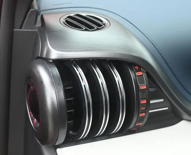 The dumbbell-like aircon vents goes well with the “gym” and “music” theme of the cabin The dumbbell-like aircon vents goes well with the “gym” and “music” theme of the cabin