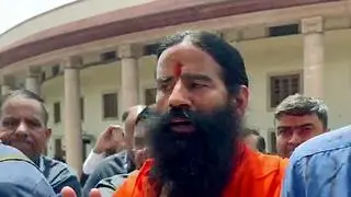 Yoga guru and brand ambassador Patanjali Ayurved Baba Ramdev speaks to the media as he leaves from the Supreme Court after attending an hearing relating to alleged misleading advertisements by Patanjali Ayurved, in New Delhi. Yoga guru and brand ambassador Patanjali Ayurved Baba Ramdev speaks to the media as he leaves from the Supreme Court after attending an hearing relating to alleged misleading advertisements by Patanjali Ayurved, in New Delhi.