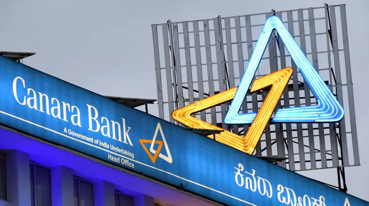 A view of Canara Bank building and  logo  in Bengaluru on Wednesday.  PHOTO : G R N Somashekar