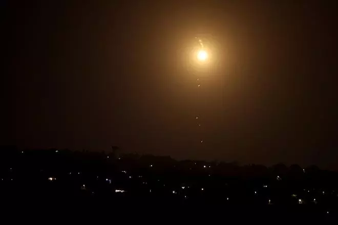 A flare burns in the sky after Iran fired a salvo of ballistic missiles at Israel amid ongoing hostilities between Hezbollah and Israeli forces, as seen from Tyre,  southern Lebanon October 1, 2024.  