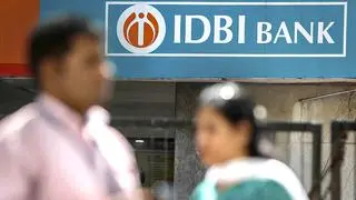 FILE PHOTO: People walk past a branch of IDBI Bank in New Delhi, India, April 5, 2023. REUTERS/Adnan Abidi/File Photo FILE PHOTO: People walk past a branch of IDBI Bank in New Delhi, India, April 5, 2023. REUTERS/Adnan Abidi/File Photo