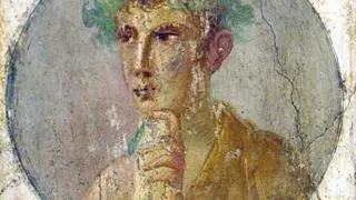 BURIED WORDS: A fresco portrait of a man holding a papyrus roll, excavated from Pompeii, Italy