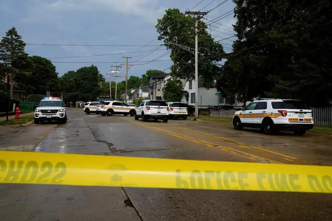 Police investigate outside the home of the mother of the man detained after a mass shooting at a Fourth of July parade route in the Chicago suburb of Highland Park, Illinois, US, July 4, 2022. REUTERS Police investigate outside the home of the mother of the man detained after a mass shooting at a Fourth of July parade route in the Chicago suburb of Highland Park, Illinois, US, July 4, 2022. REUTERS