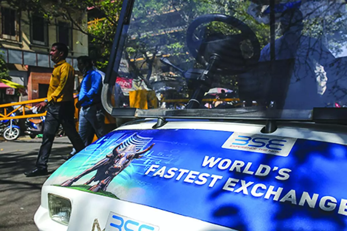 A vehicle features an advertisement for the Bombay Stock Exchange (BSE) outside the bourse’s building in Mumbai