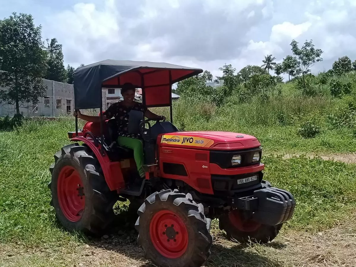 Kochi: A woman learns to drive a tractor during an eight-day-long training session, in Mulanthuruthy village, near Kochi