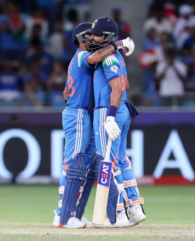 India’s Shreyas Iyer celebrates after reaching his half century with Virat Kohli