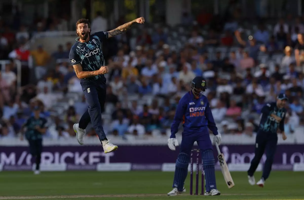 England’s Reece Topley celebrates after taking the wicket of India’s Prasidh Krishna for a total of 6 wickets, in the second one-day international at Lord’s Cricket Ground in London on Thursday.