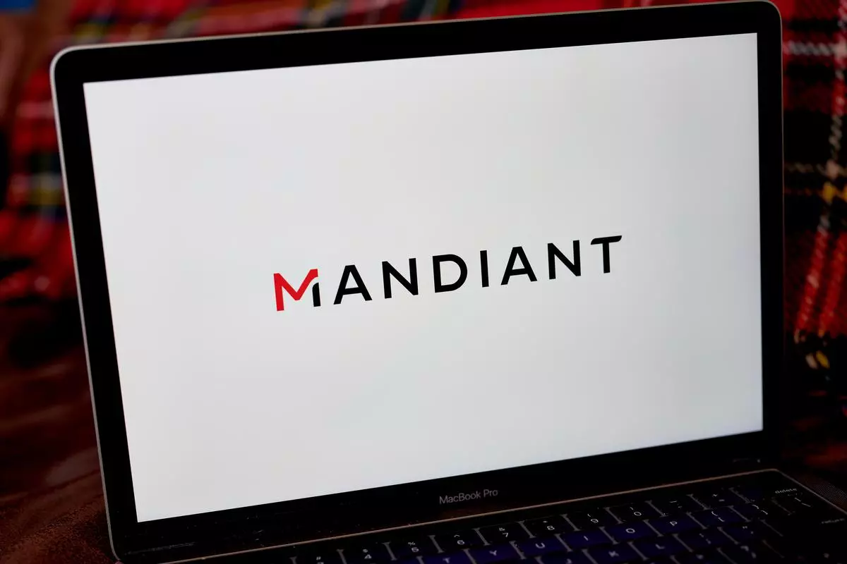 The Mandiant logo on a laptop computer arranged in the Brooklyn borough of New York, U.S., on Tuesday, March 8, 2022. Google agreed to acquire cybersecurity company Mandiant Inc. for $5.4 billion, its second-biggest deal ever. Photographer: Gabby Jones/Bloomberg