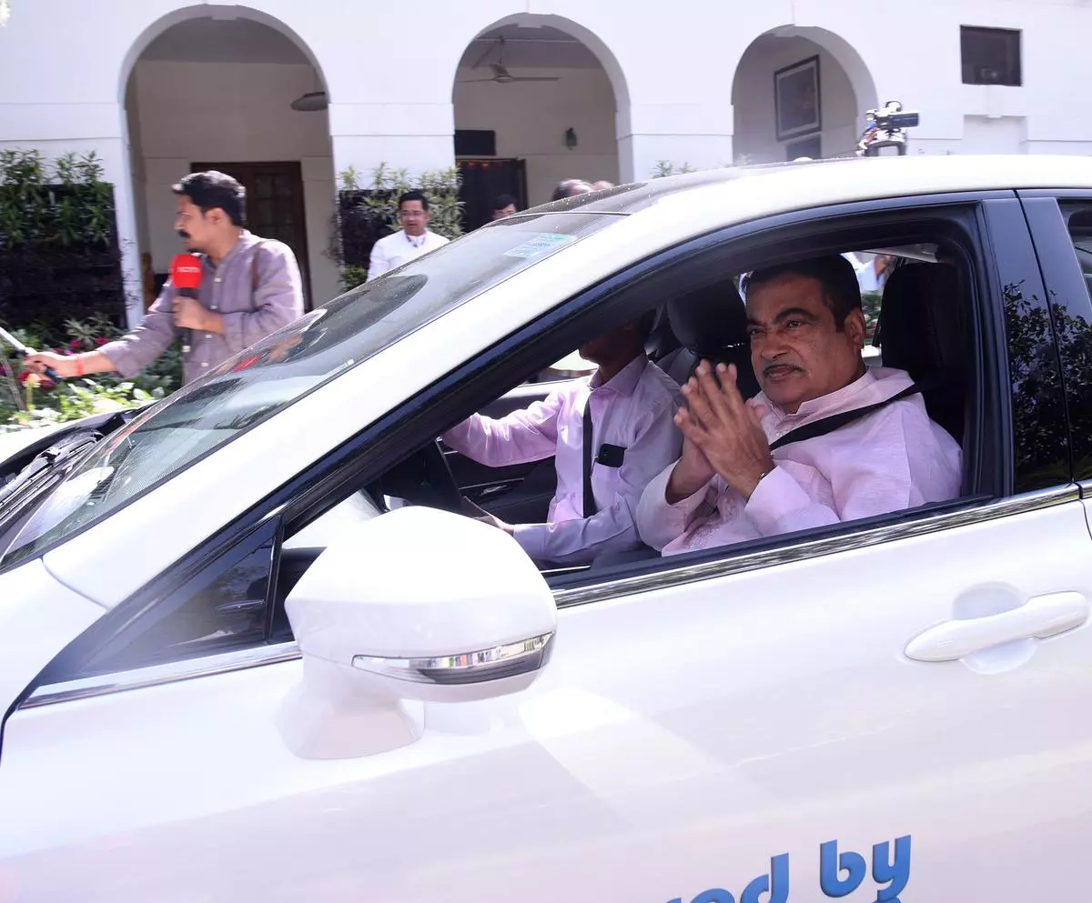 Union Road Transport & Highways Minister Nitin Gadkari leaving from his residence for the Parliament in a hydrogen-powered car on Wednesday