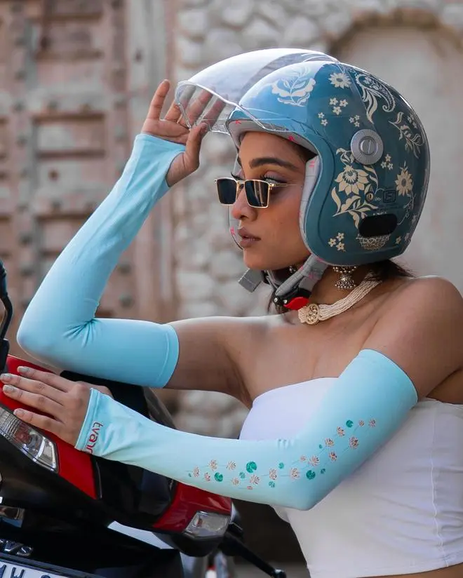 Tvarra helmets are designed like fashion accessories in vibrant colours and with floral motifs