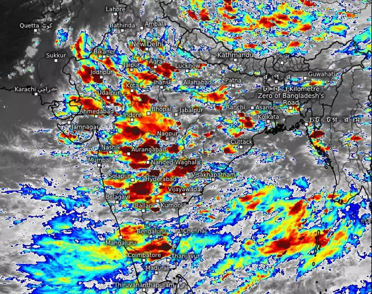 Heavy rain clouds (red in colour) spread out from the South Peninsula into the North Peninsula, Central India and North-West India on Thursday as the monsoon looks to strengthen further with a low-pressure area shaping up in the Bay of Bengal in the next three days.