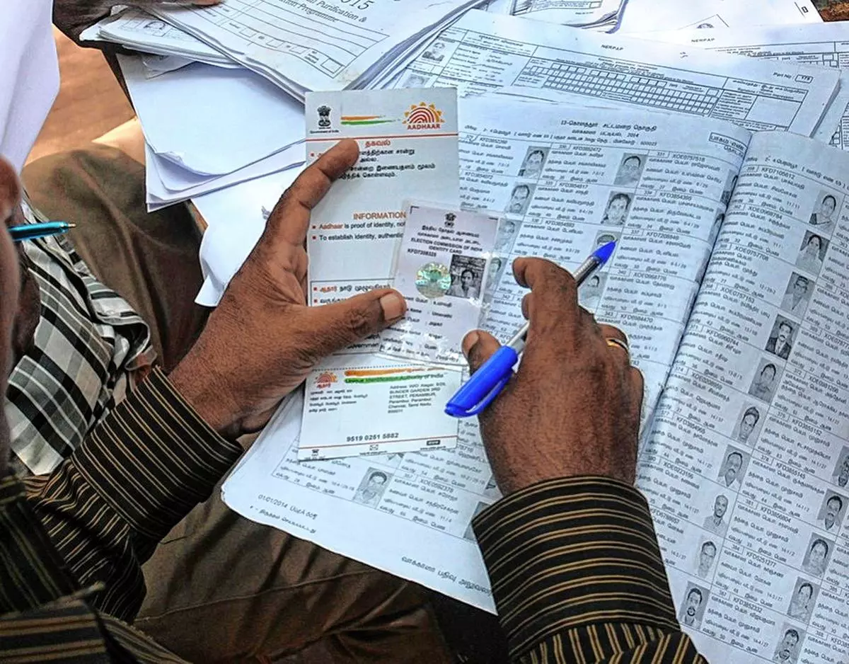 Activists argue that Aadhar-linked databases, which are linked to various cases of fraud, will increase the chances of voter fraud (file photo)