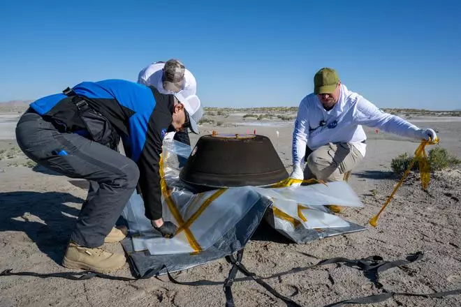 The return capsule containing a sample collected from the asteroid Bennu in October 2020 by NASA’s OSIRIS-REx spacecraft is seen shortly after touching down in the desert at the Department of Defense’s Utah Test and Training Range in Dugway, Utah, U.S. September 24, 2023.  