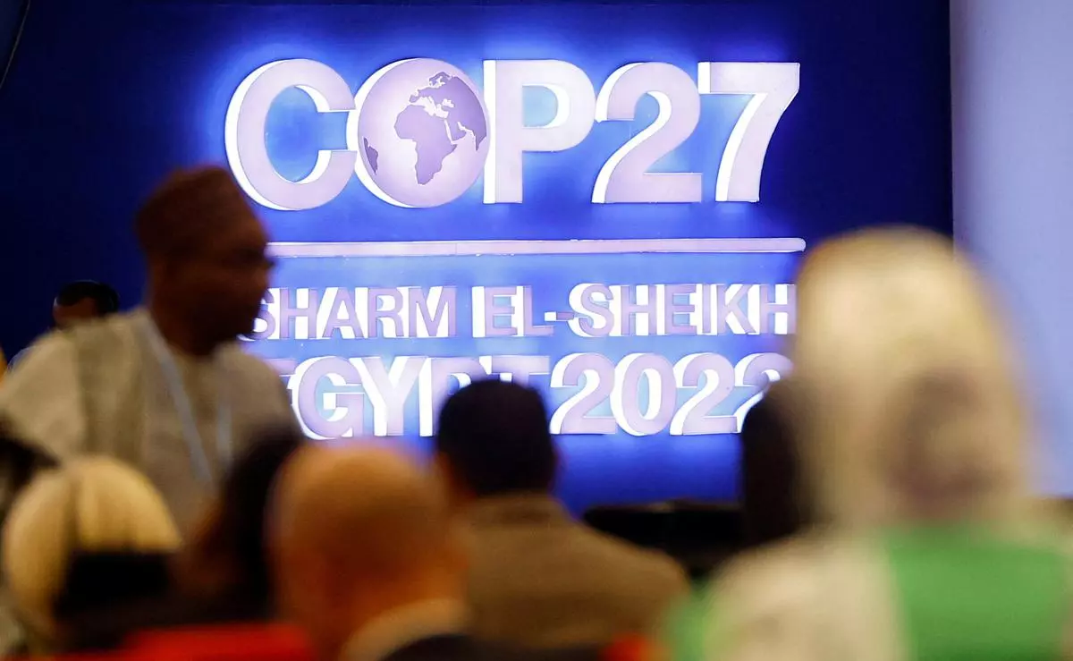 Attendees sit during the COP27 climate summit in Sharm el-Sheikh