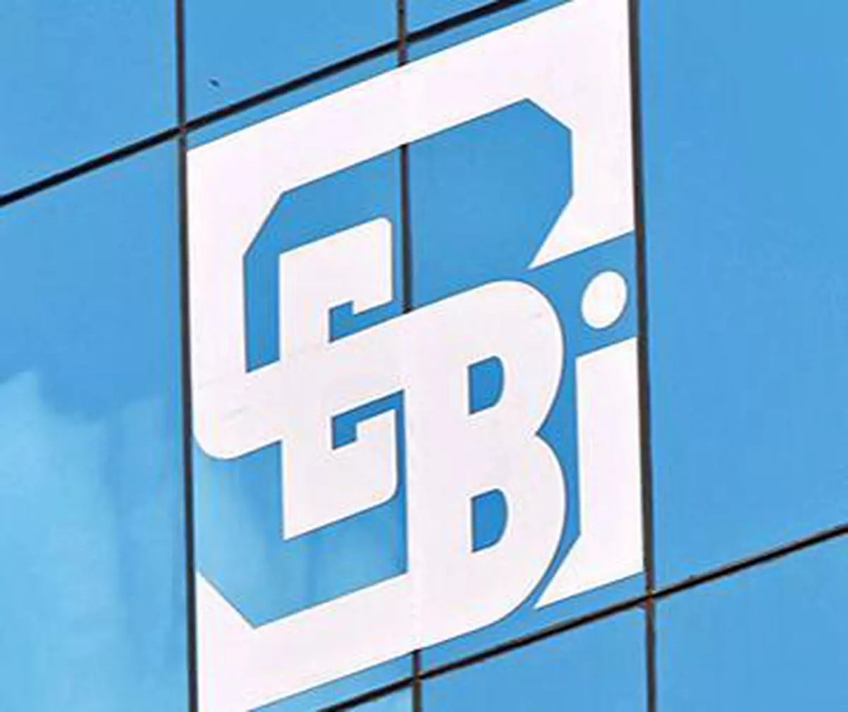 File Photo: The logo of the Securities and Exchange Board of India (SEBI), India’s market regulator, is seen on the facade of its head office building in Mumbai.