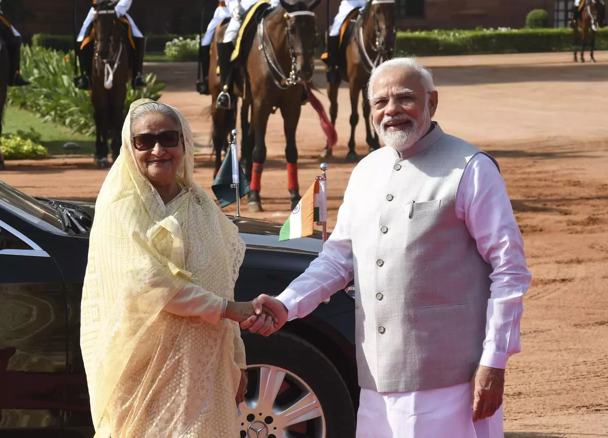 Prime Minister Narendra Modi with his Bangladeshi counterpart, Sheikh Hasina, during her ceremonial reception at the Rashtrapati Bhavan in New Delhi on Tuesday