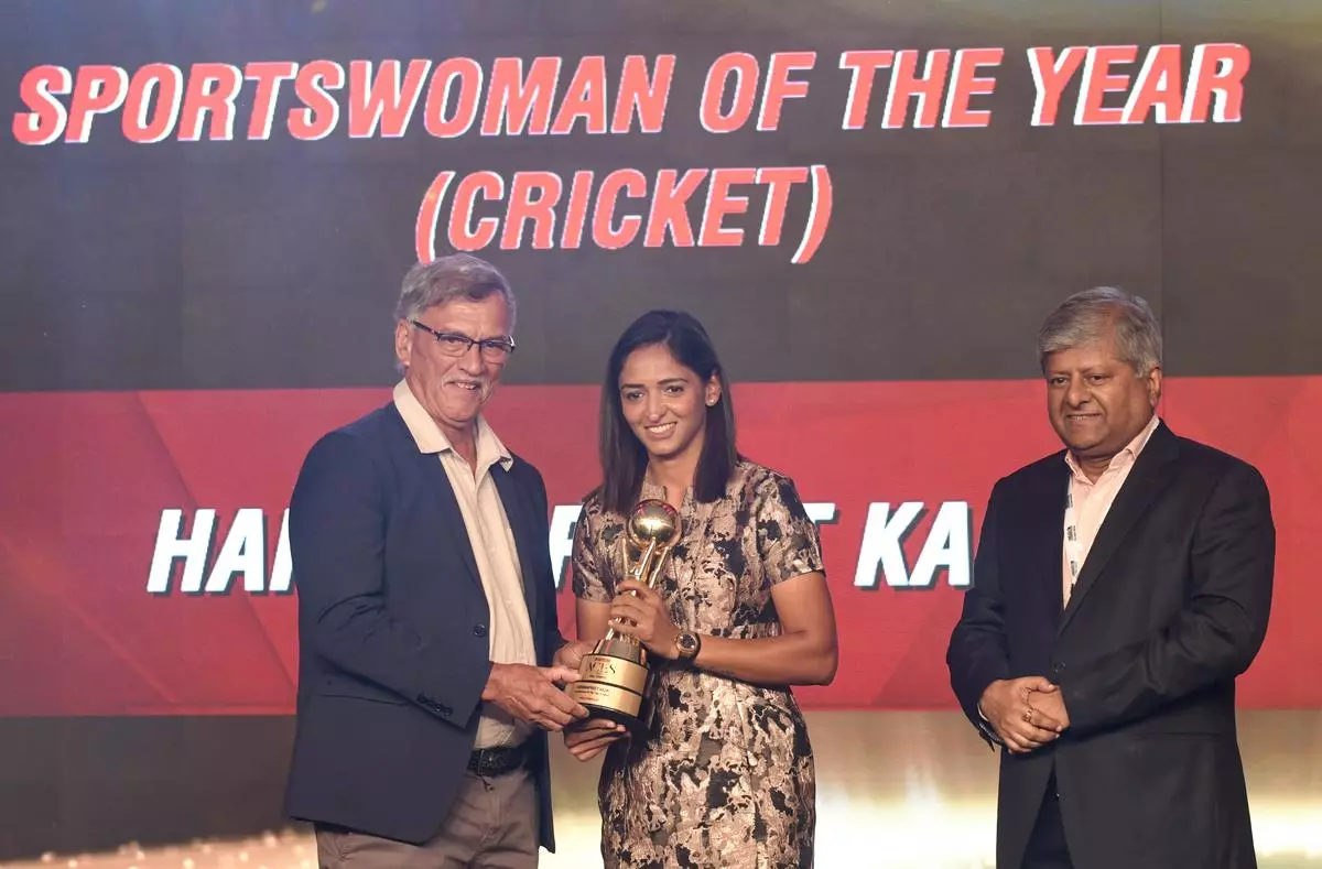 Harmanpreet Kaur receiving the Sportswoman of the Year (Cricket) award from BCCI President Roger Binny at the Sportstar Aces awards in Mumbai on Monday.