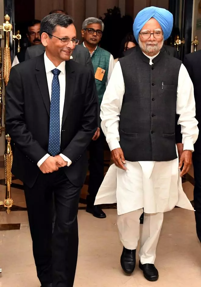 Former Prime Minister Dr. Manmohan Singh being ushered to the 2019 Change Maker Awards by K. Venugopal, founder editor of businessline.