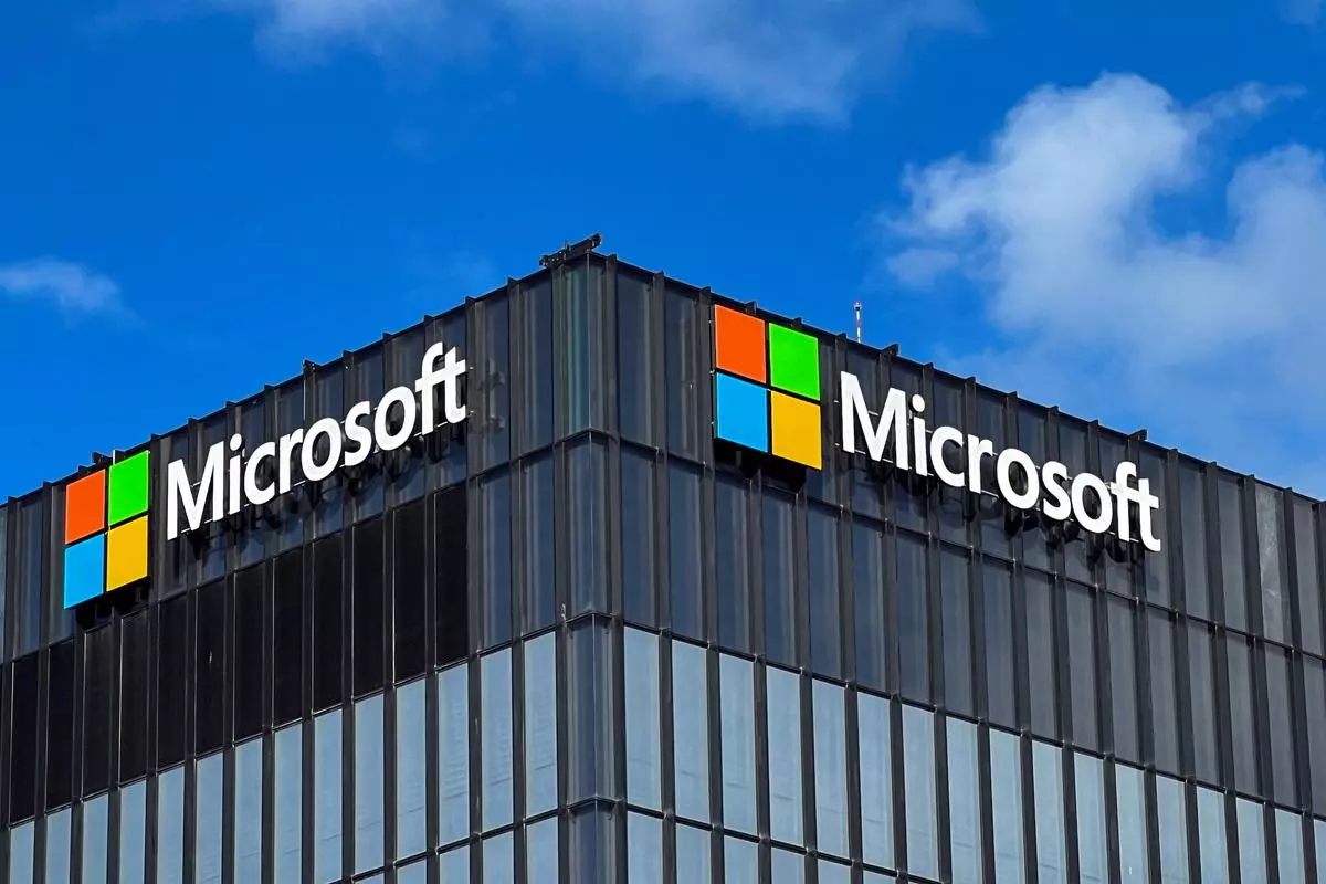 The logo of Microsoft is seen on the exterior of an office.