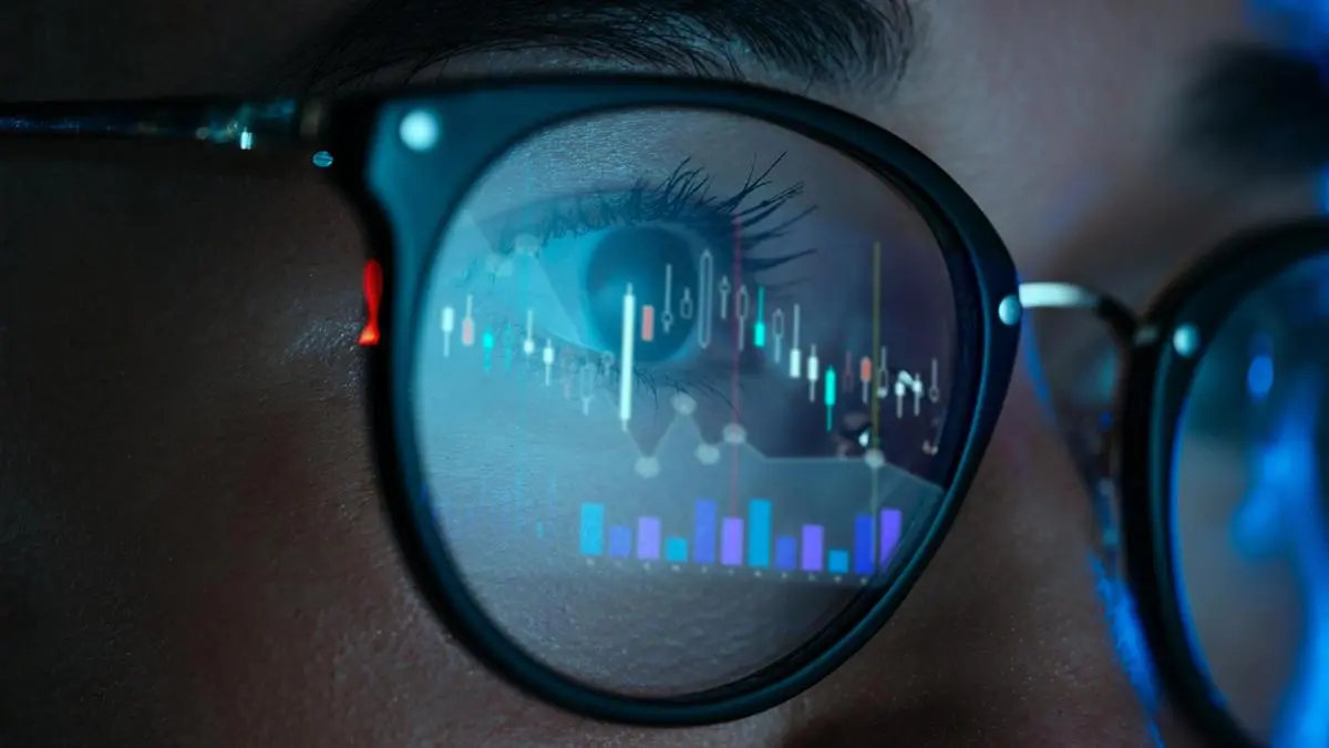 Nifty claws back 500 points from day's low; after a volatile session