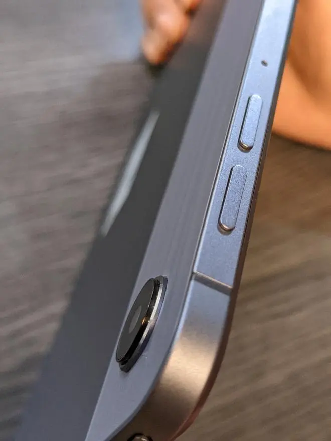 There are three physical buttons — the power button on the left bezel, and the volume rockers on top There are three physical buttons — the power button on the left bezel, and the volume rockers on top