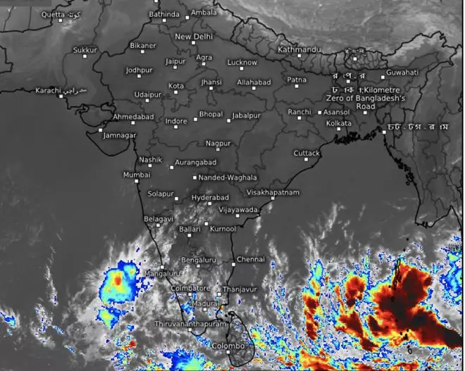 Dangerous thunderstorms (in red) around the periphery of the low-pressure area on Monday morning, as revealed by satellite pictures. This is forecast to develop into a cyclone over the next two-three days. 