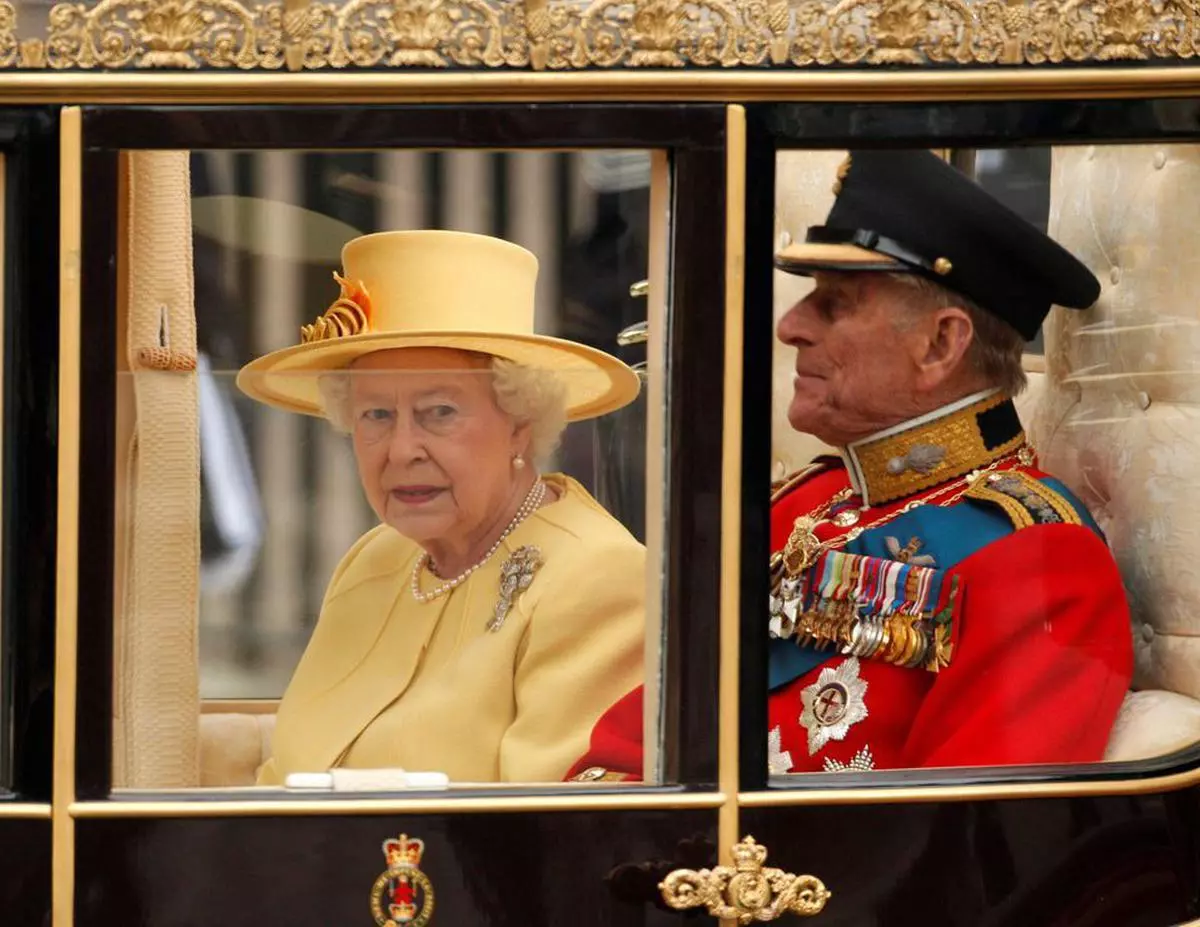 Britain’s Queen Elizabeth and Prince Philip travel to Buckingham Palace (file photo)