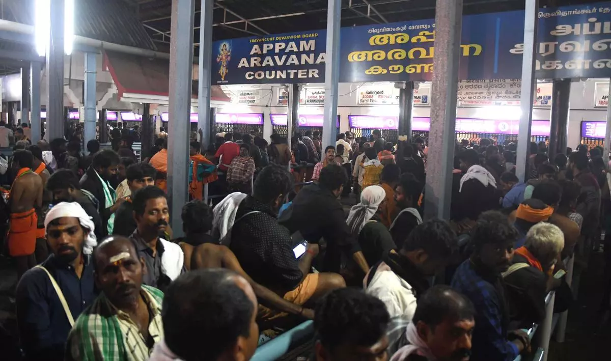 File Photo: Pilgrims waiting at the counters to buy Aravana Prasadam at Sabarimala.
