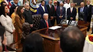 U.S. President Donald Trump answers questions from reporters during a celebration of Diwali in the Oval Office of the White House in Washington, D.C., U.S.