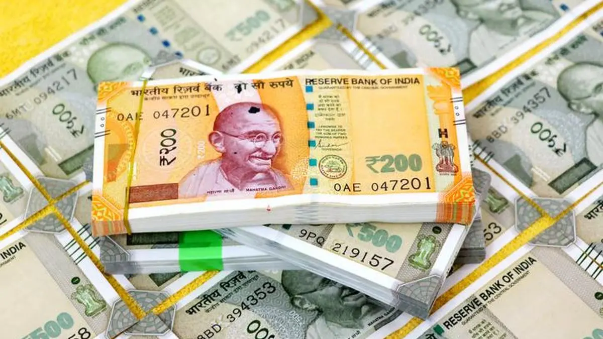 Rupee seen sliding to 100 per Dollar as Oil prices surge