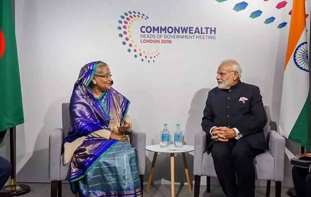  Prime Minister Narendra Modi with his Bangladeshi counterpart Sheikh Hasina, at a meeting on the sidelines of CHOGM 2018, in London on Thursday. - PTI 