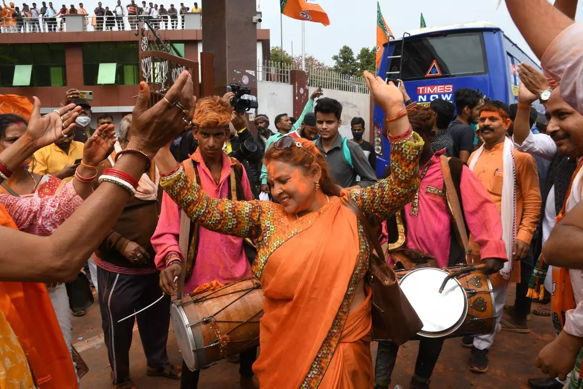 BJP workers celebrating the party victory in Uttar Pradesh Assembly Elections at party office, in Lucknow on Thursday March 10 2022.  PHOTO: SANDEEP SAXENA 
