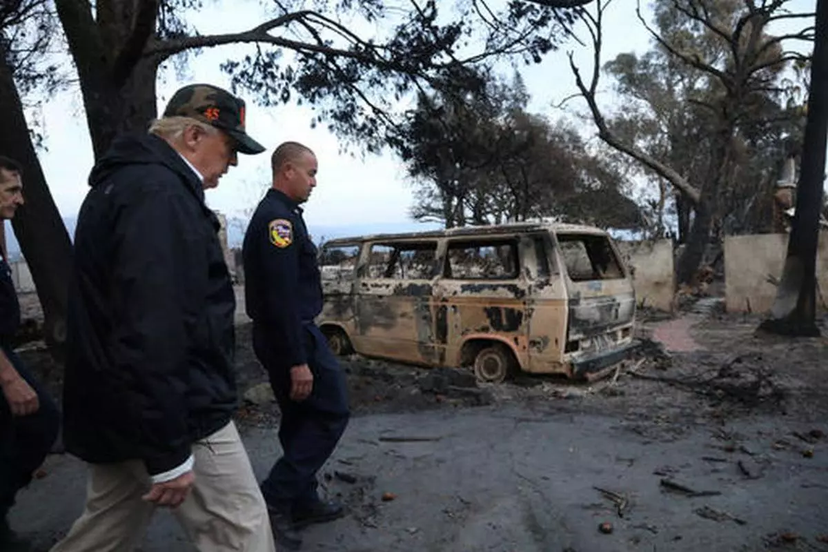 U.S. President Donald Trump surveys homes destroyed by the Woolsey fire in Malibu, California, on November 17, 2018.