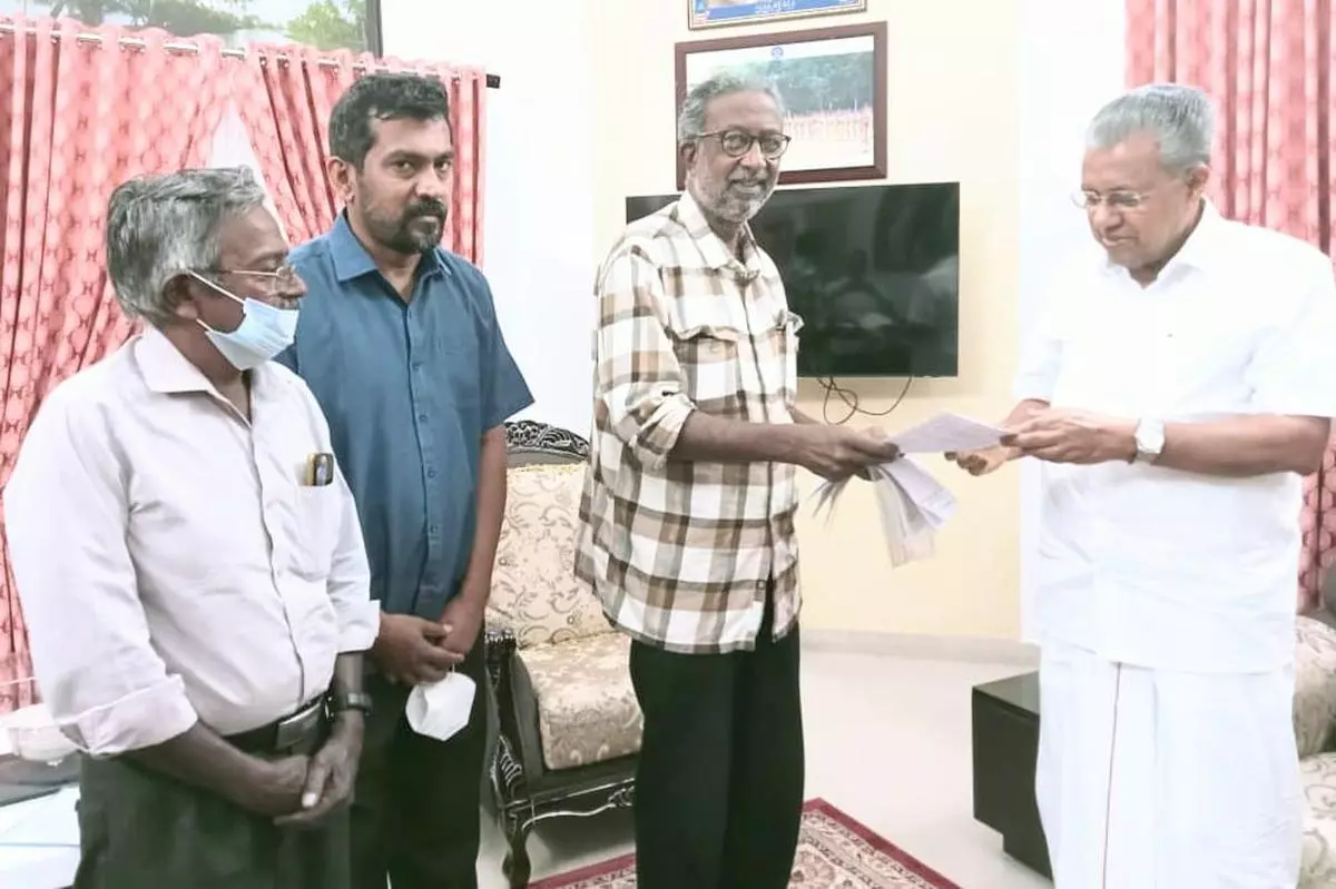 Elias John, President, Vizhinjam Mother Port Action Committee (V-Mac), met Kerala Chief Minister Pinarayi Vijayan before launching an indefinite strike for resumption of work on the port on Monday. Others in the picture are Wilfred Culas and Prashant David, Secretary and Executive Member of V-Mac.