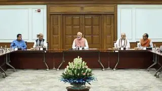 Prime Minister Narendra Modi with Defence Minister Rajnath Singh, Union Home Minister Amit Shah, Union Ministers Nitin Gadkari, Shivraj Singh Chouhan and others during a meeting to discuss the roadmap for next-generation reforms in New Delhi. (@narendramodi on X via PTI Photo) 