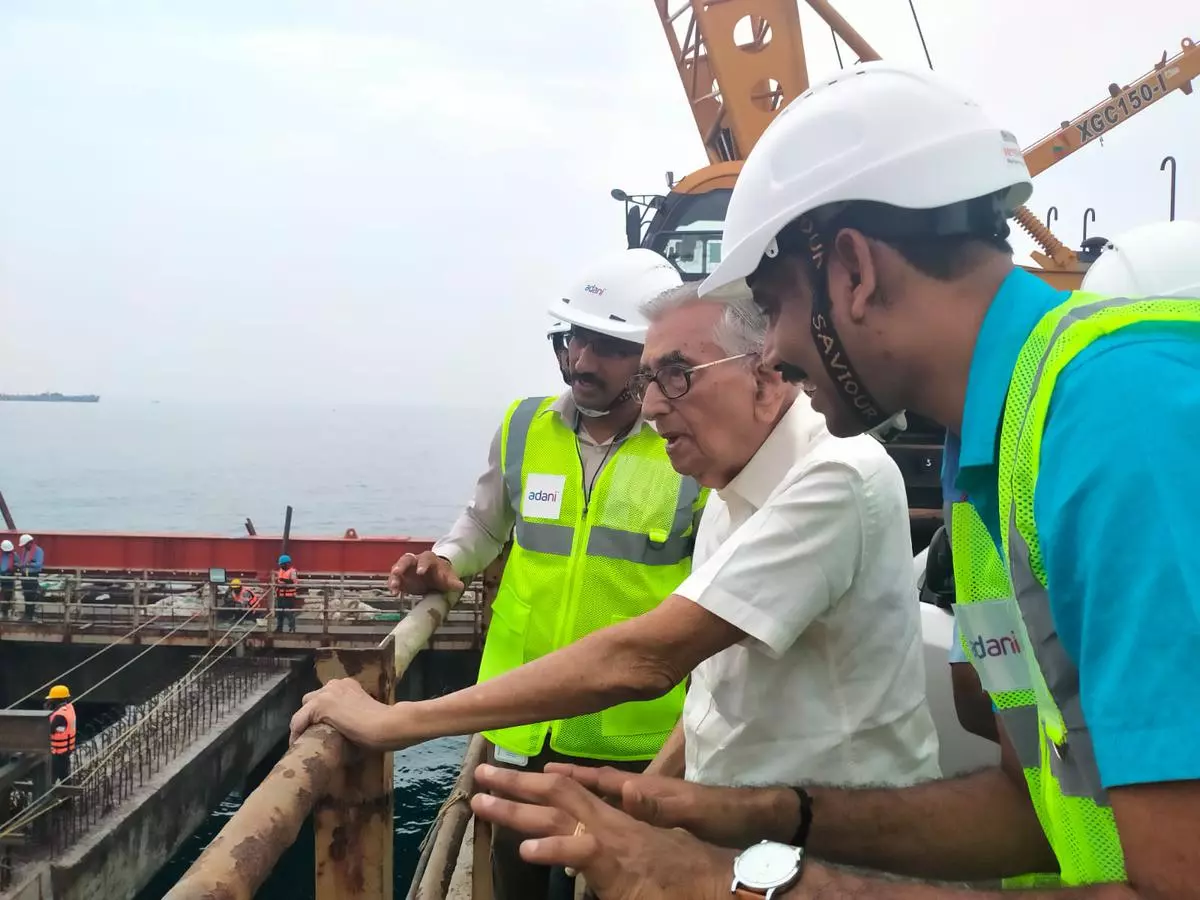 Centenarian engineer and former surveyor GG Menon shown around the breakwater under construction at the site of the Vizhinjam International Seaport and Transshipment Container Terminal near Thiruvananthauram.
