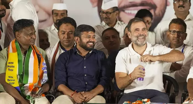 Congress leader Rahul Gandhi with party candidates Udit Raj and Kanhaiya Kumar during a rally for Lok Sabha elections, in New Delhi, Saturday, May 18, 2024.  