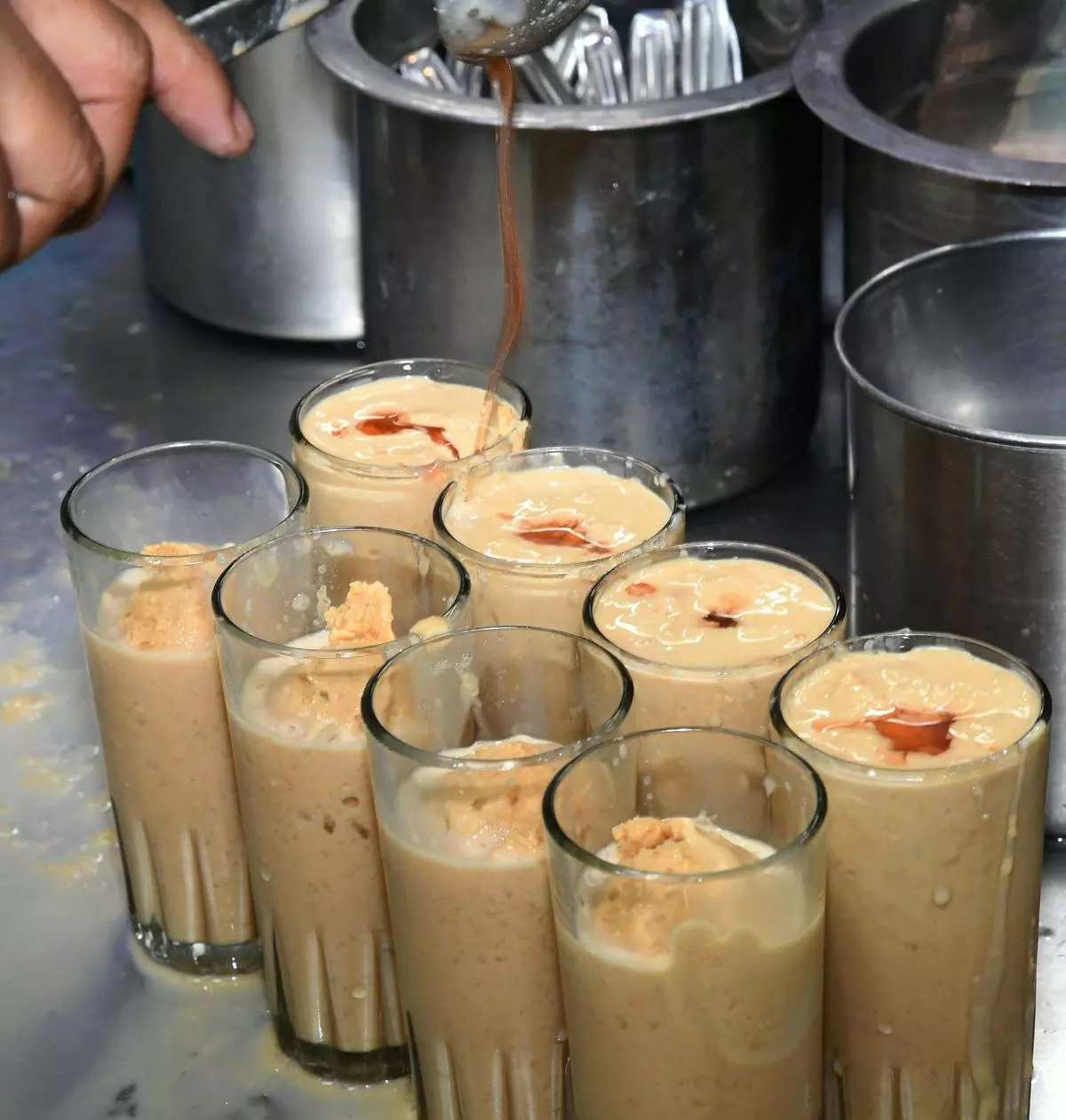 The ingredients that go into the making of Jigarthanda are milk, almond pisin, basundi, ice cubes and sherbet