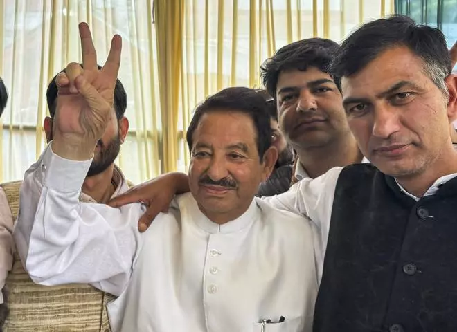 Former Minister & Congress candidate Peerzada Mohammed Syed with supporters celebrates his victory in the J&K Assembly polls, in Anantnag on Tuesday.