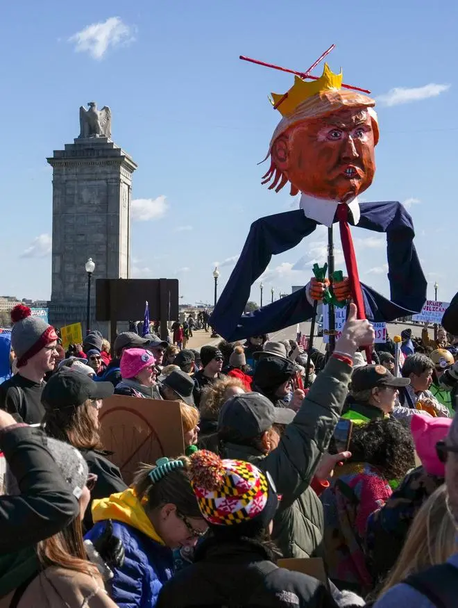 Demonstrators attend a 'No Kings' protest against U.S. President Donald Trump administration's policies, in Washington, D.C., U.S., March 28, 2026.