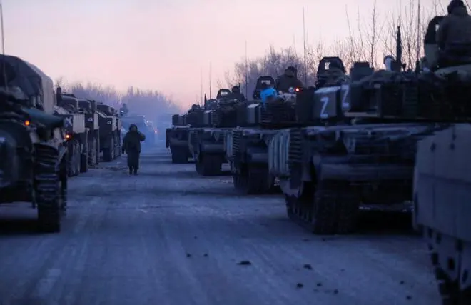 A view shows an armoured convoy of pro-Russian troops in the course of Ukraine-Russia conflict on a road leading to the besieged southern port city of Mariupol, Ukraine March 28, 2022. A view shows an armoured convoy of pro-Russian troops in the course of Ukraine-Russia conflict on a road leading to the besieged southern port city of Mariupol, Ukraine March 28, 2022.