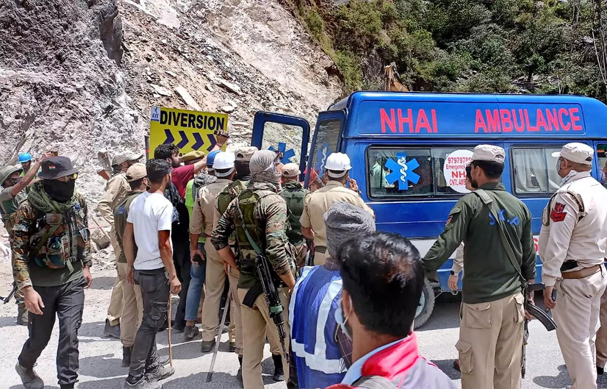 Rescue operation underway on the second consecutive day to save labourers trapped under debris following the collapse of an under-construction tunnel on the Jammu-Srinagar national highway, near Magarkote in Ramban district, Saturday, May 21, 2022. (PTI) 
