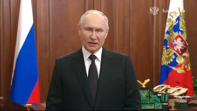 Russian President Vladimir Putin gives an emergency televised address in Moscow, Russia, June 24, 2023, in this still image taken from a video. 