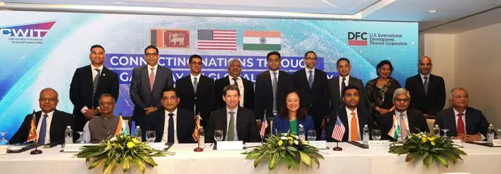 Karan Adani, third from right, Julie Chung, US Ambassador to Sri Lanka, fourth from right and DFC CEO, Scott Nathan, fourth from left.